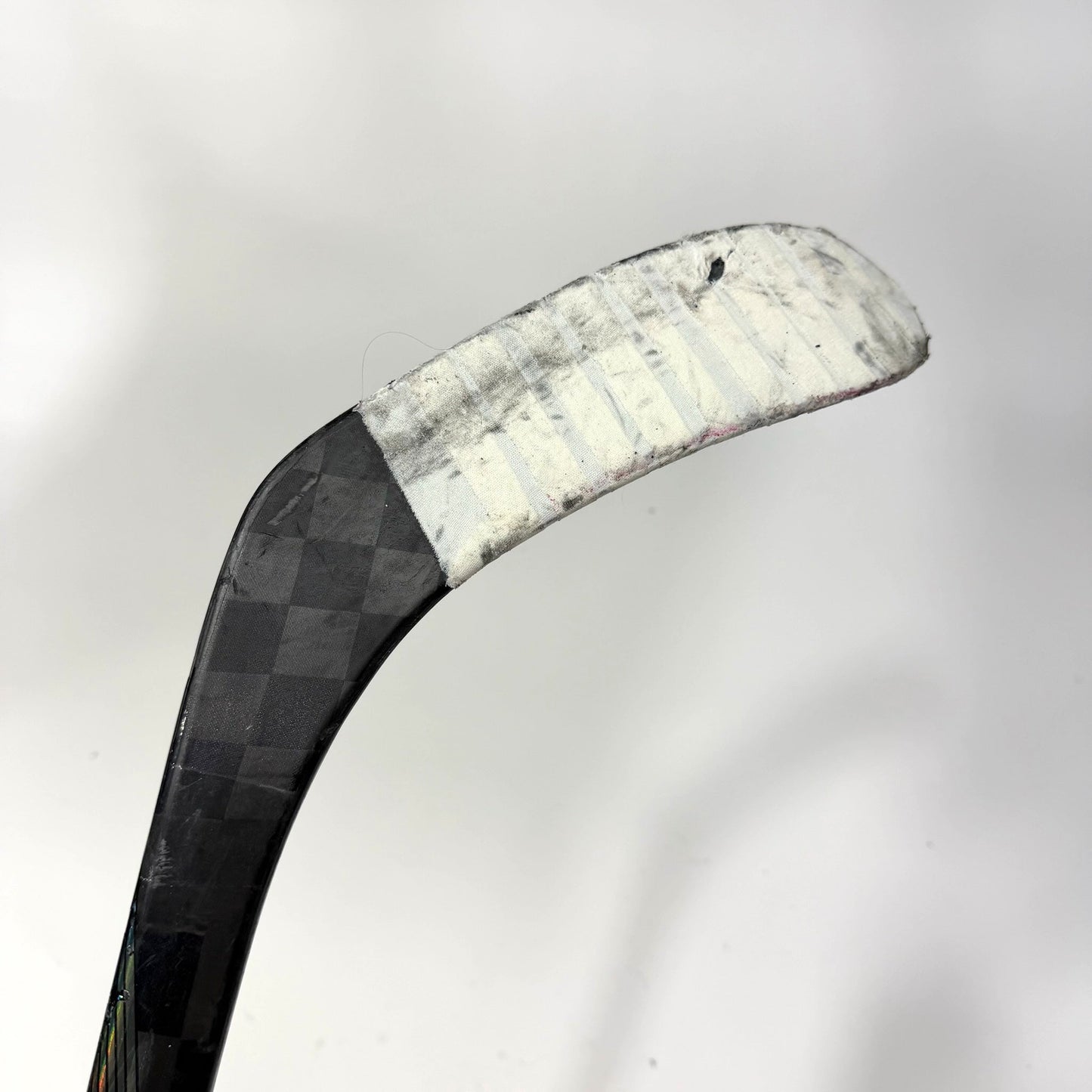 Used Left Red Bauer Nexus Tracer | 55 Flex P28 Curve Grip | AB699