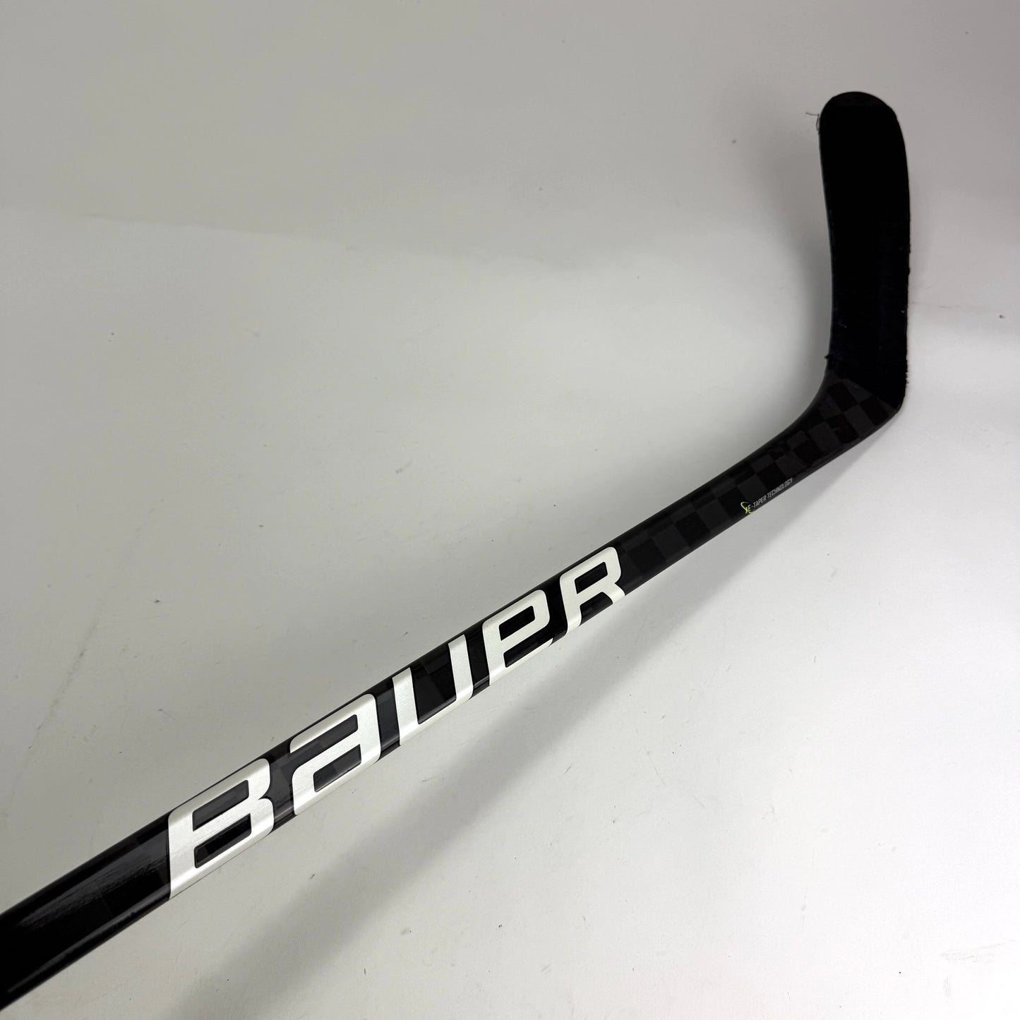 Used Left Silver Bauer Vapor Hyperlite | 112 Flex P91 Heel Curve Grip | E609