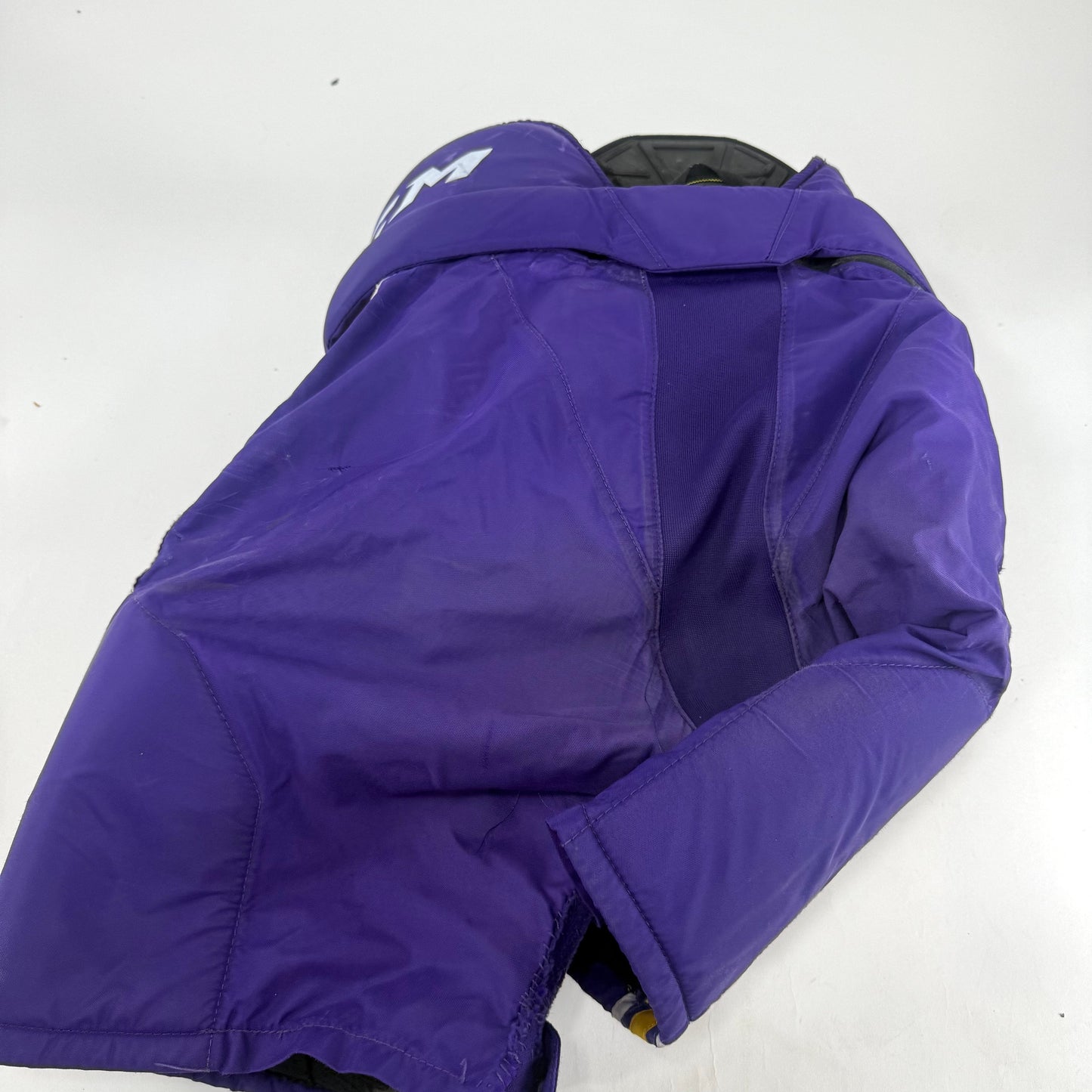 Used Purple/Yellow CCM Tacks 65C Pants | Large | E530