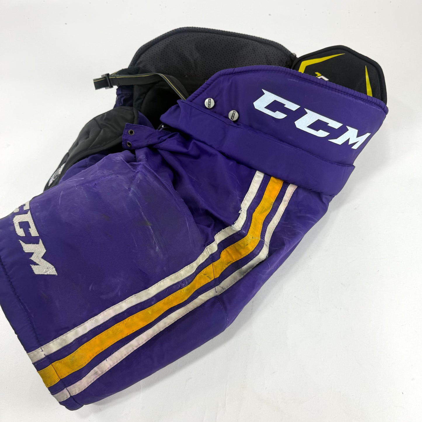 Used Purple/Yellow CCM Tacks 65C Pants | Large | E533