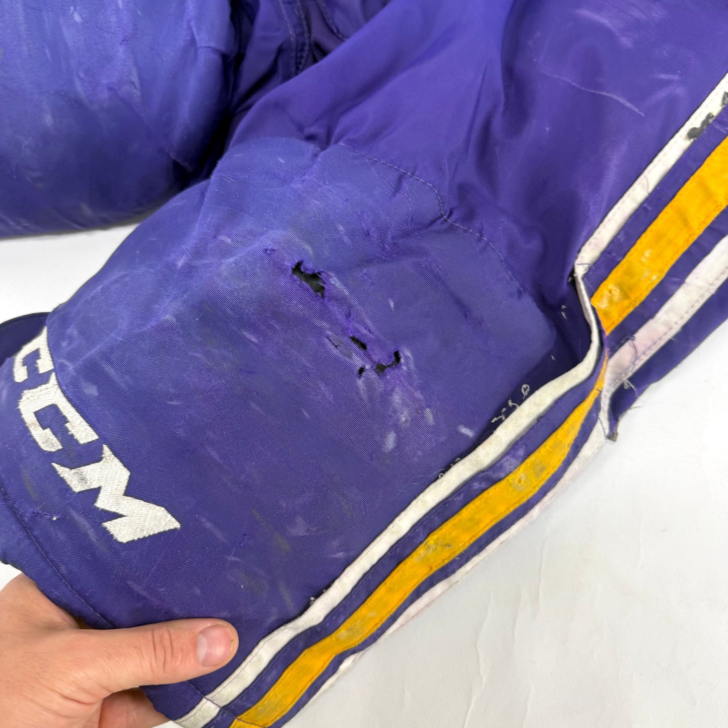Used Purple/Yellow CCM Tacks 65C Pants | Medium | E548