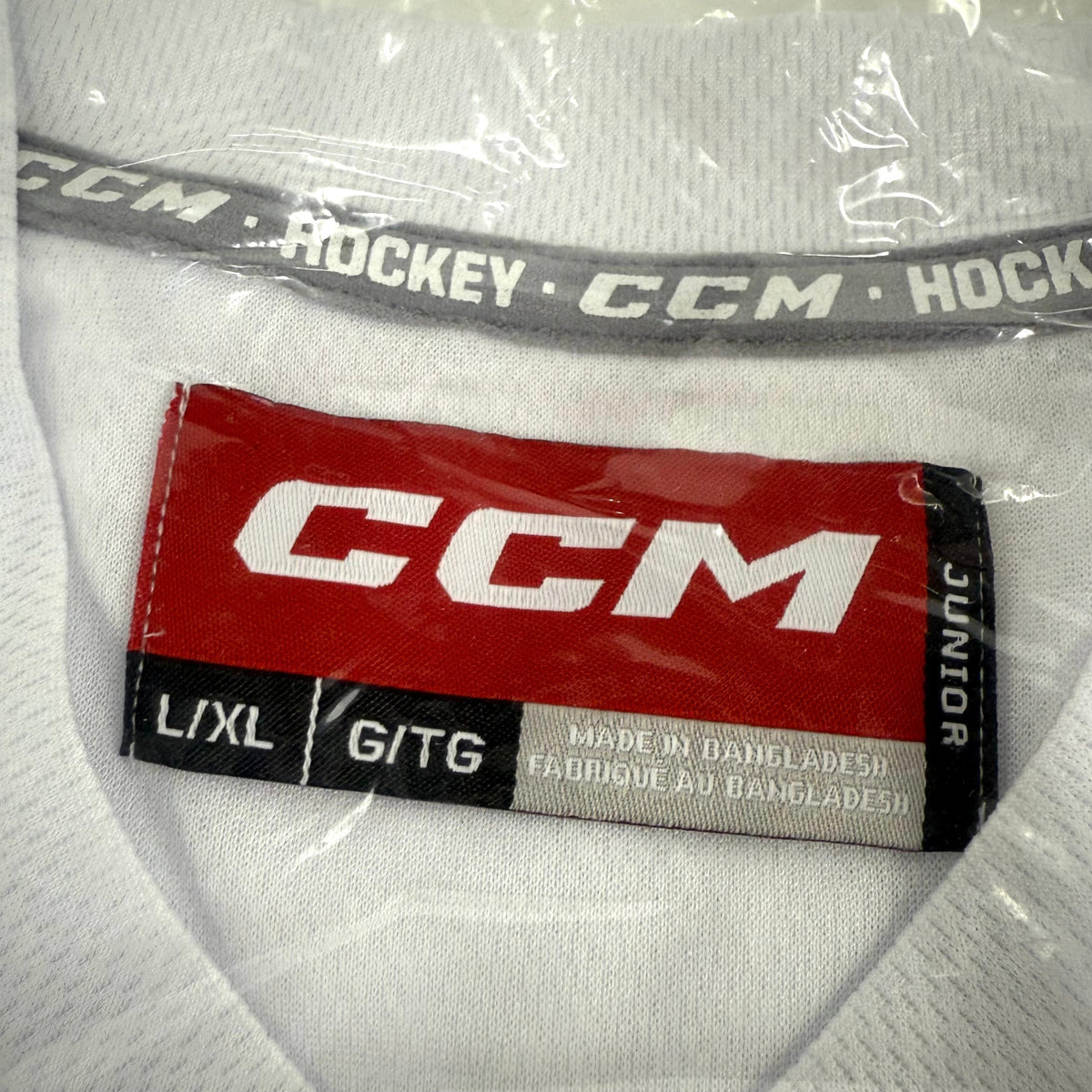 New White CCM Practice Jersey | Junior Large/XL - Top Flight Hockey